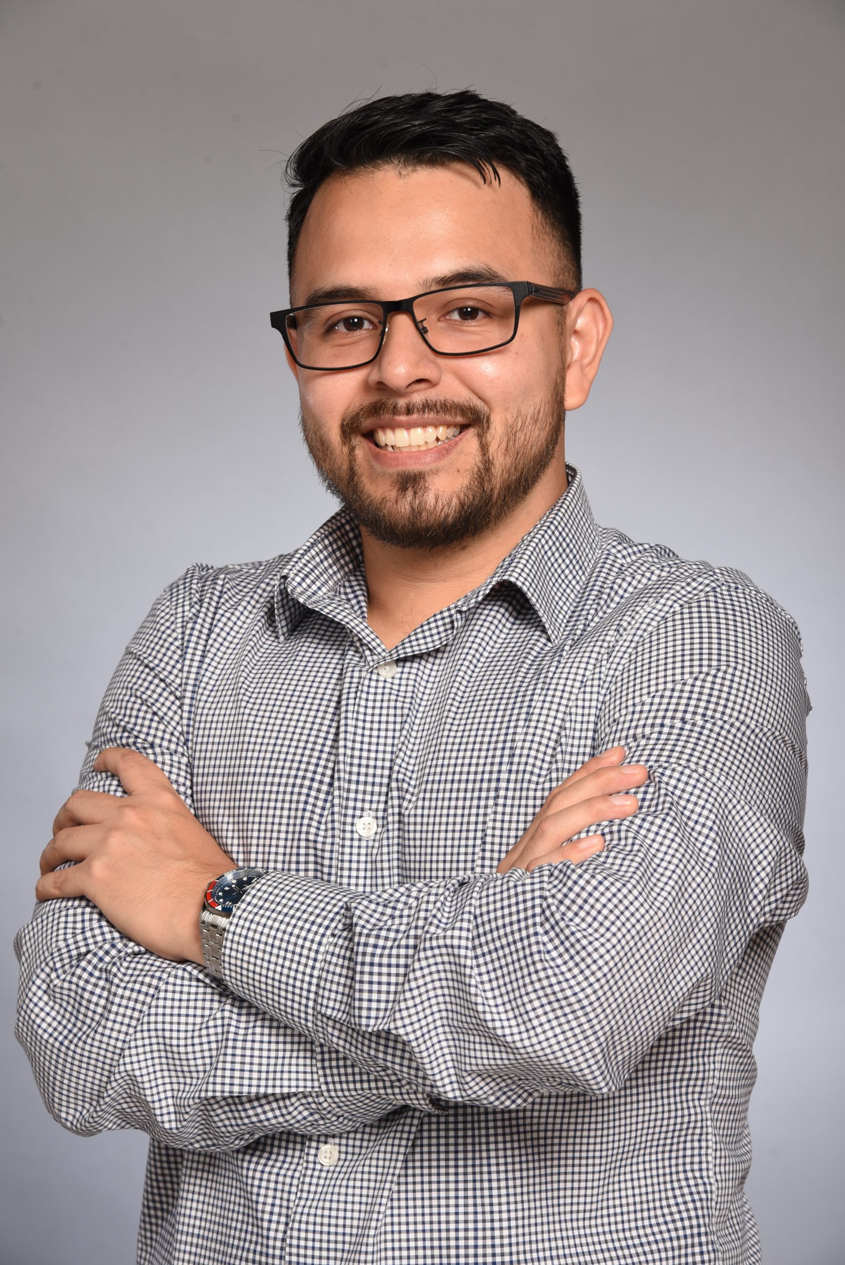 watch showing Juan Cespedes Zoho Solutions